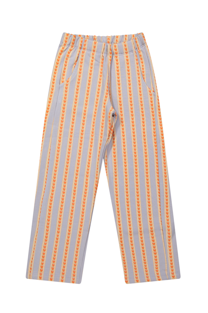 Striped pants with orange and gray pattern on a white background