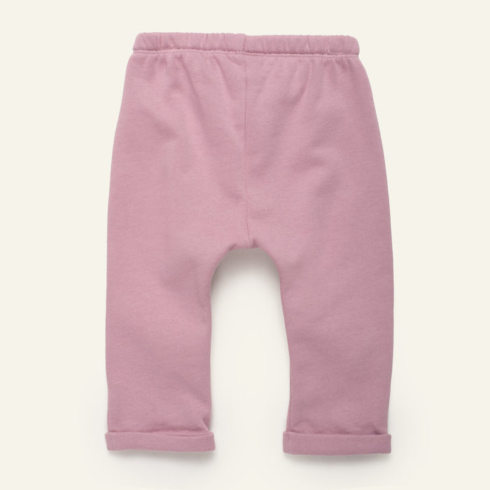 Pink baby pants on a white background