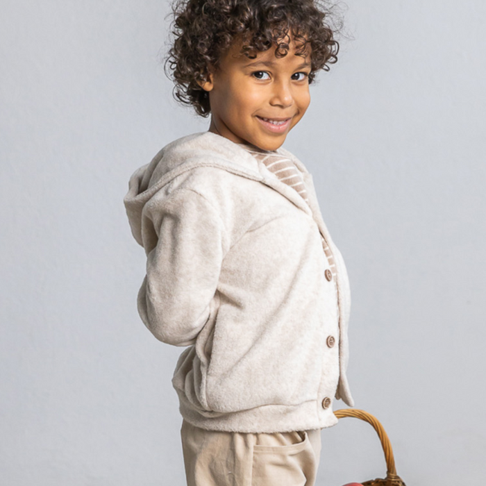 Child wearing hooded sweater