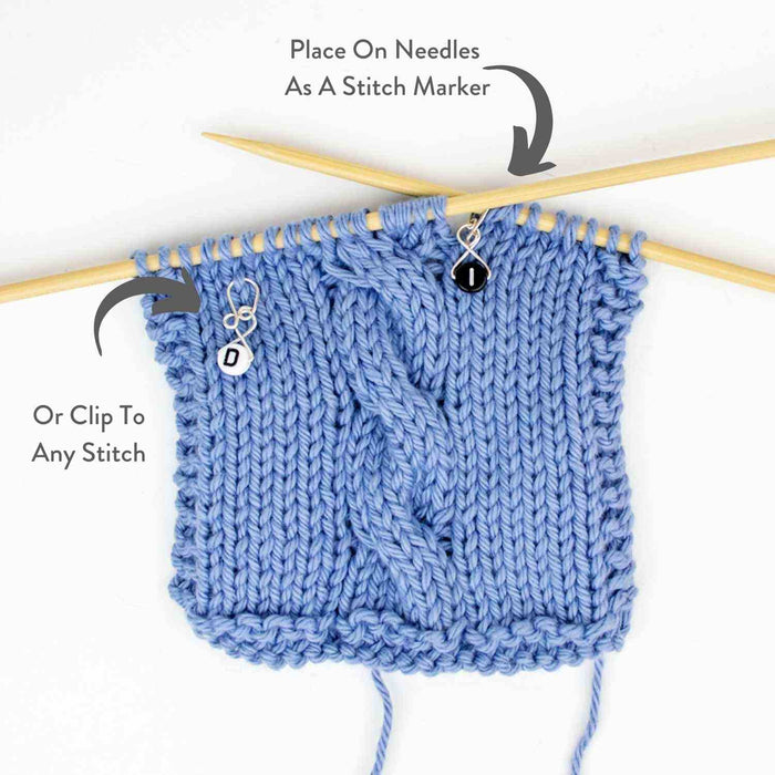 Instructional image showing I and D markers placed on needles as stitch markers or clipped to any stitch in knitting