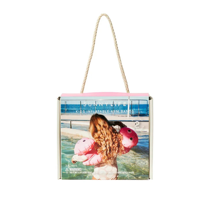 Product packaging for Sunny Life inflatable arm bands with a child in water on a white background