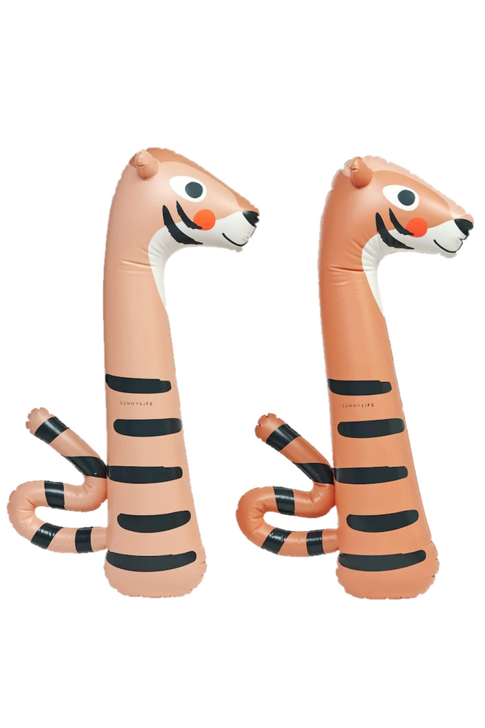 Two inflatable tiger toys with cartoon faces on a white background
