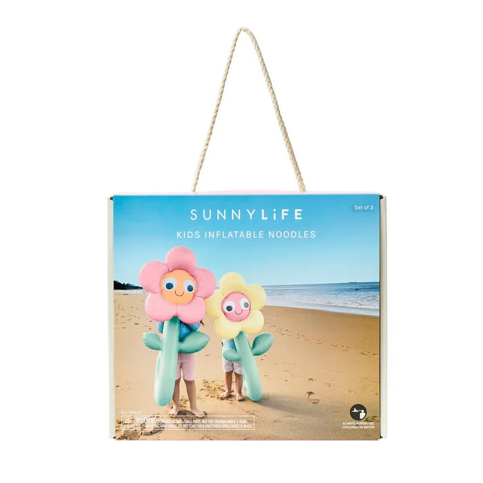 Sunnylife kids inflatable noodles packaging on a beach