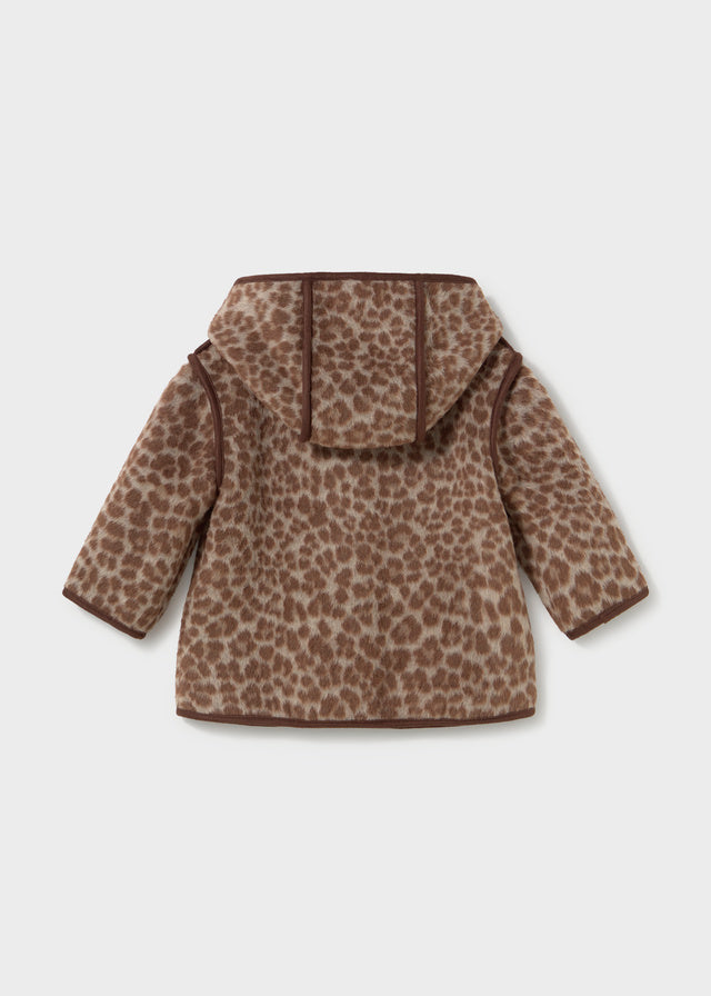 Leopard print coat on a light gray background