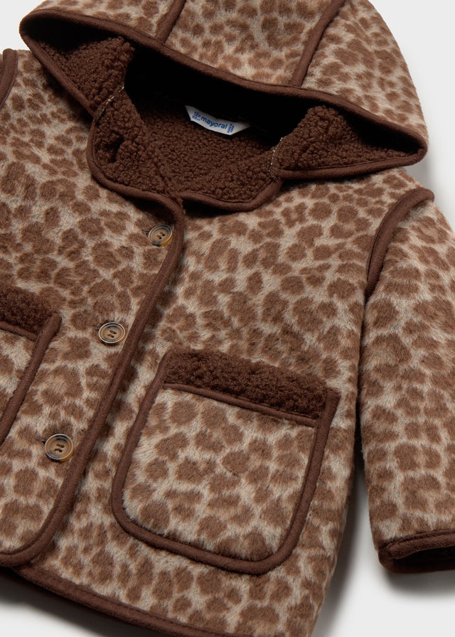 Leopard print coat with brown hood and buttons on a white background
