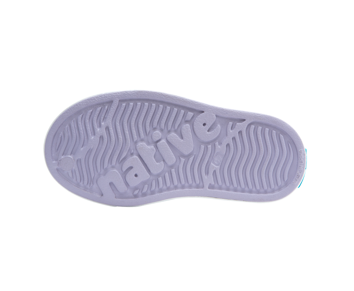 Purple shoe sole with 'native' branding on a white background