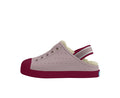 Pink and red slip-on shoe with a white sole on a light gray background