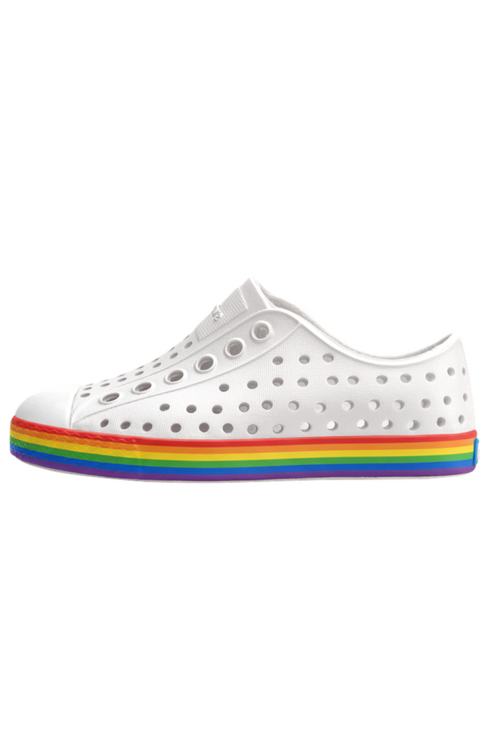 White sneaker with a rainbow sole on a white background