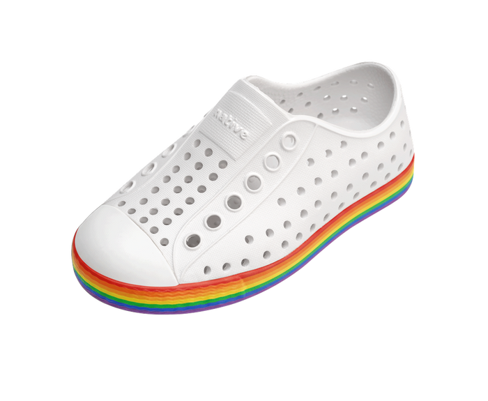 White shoe with rainbow sole on a white background