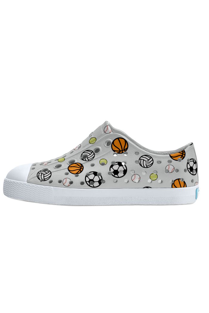 grey sneaker with sports ball patterns