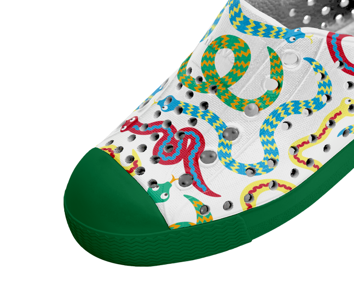 Colorful snake pattern on a white shoe with green sole