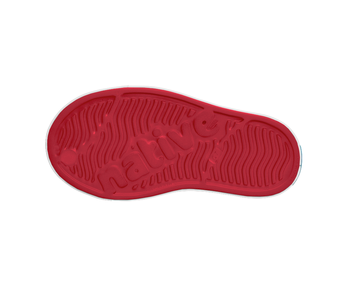 Red sole of a shoe with visible branding on a white background