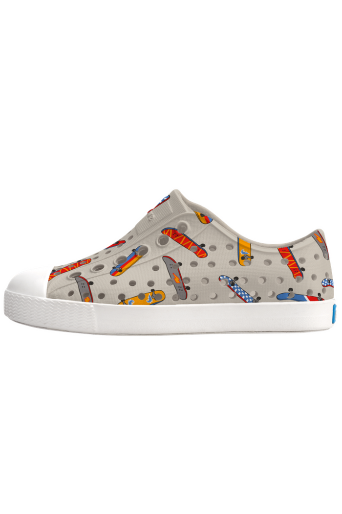 Sneaker with skateboard pattern on a white background