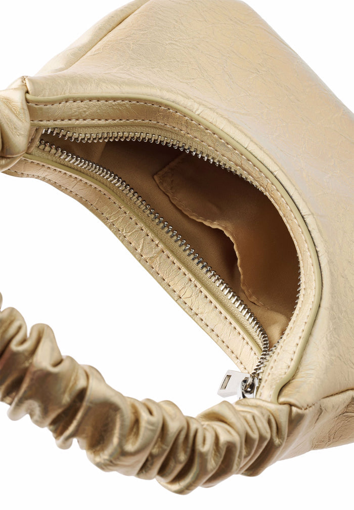 Beige handbag with ruched handle and zipper on a white background
