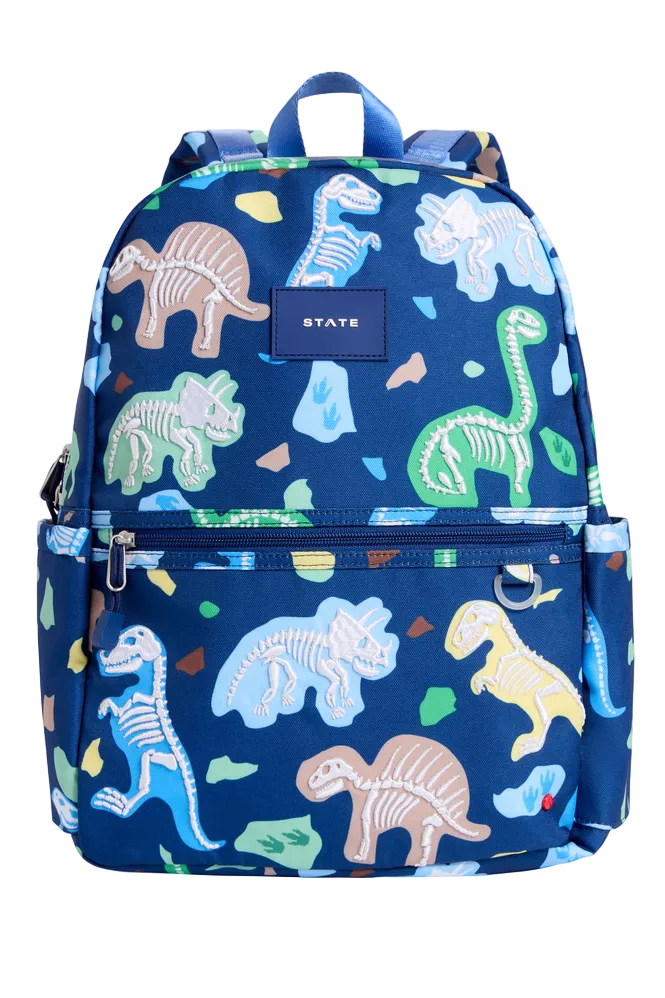 Blue backpack with dinosaur pattern on a white background