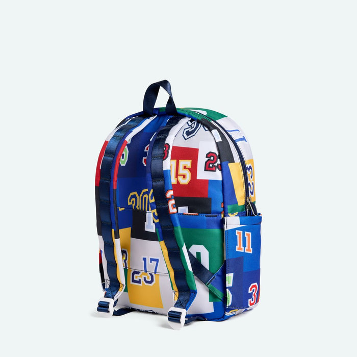 Colorful backpack with sports jersey pattern on a white background