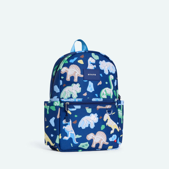 Blue backpack with dinosaur pattern on a white background