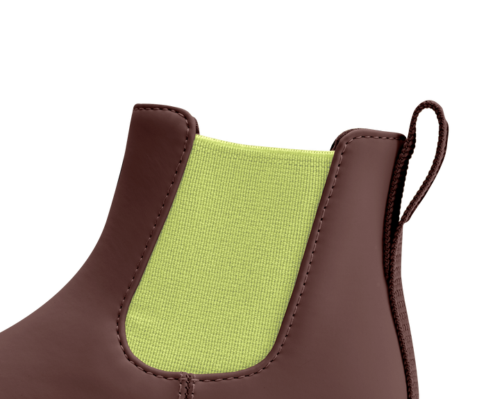 Brown boot with green lining on a transparent background