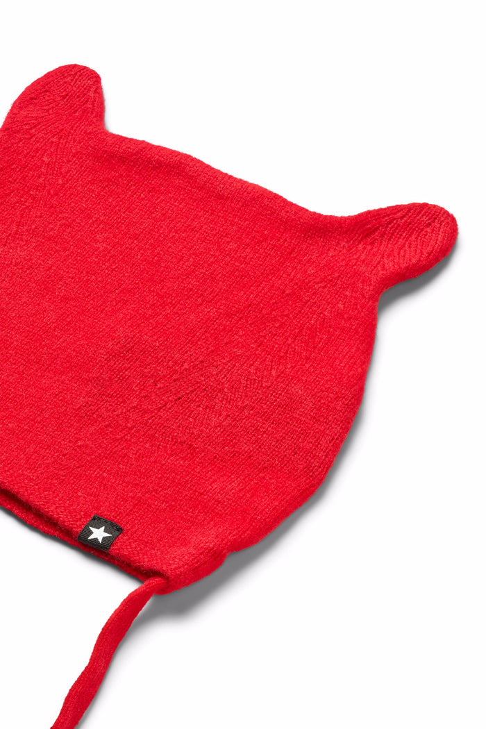 Red baby bonnet with cat ears on a white background