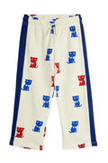 White pants with blue and red cat prints on a white background