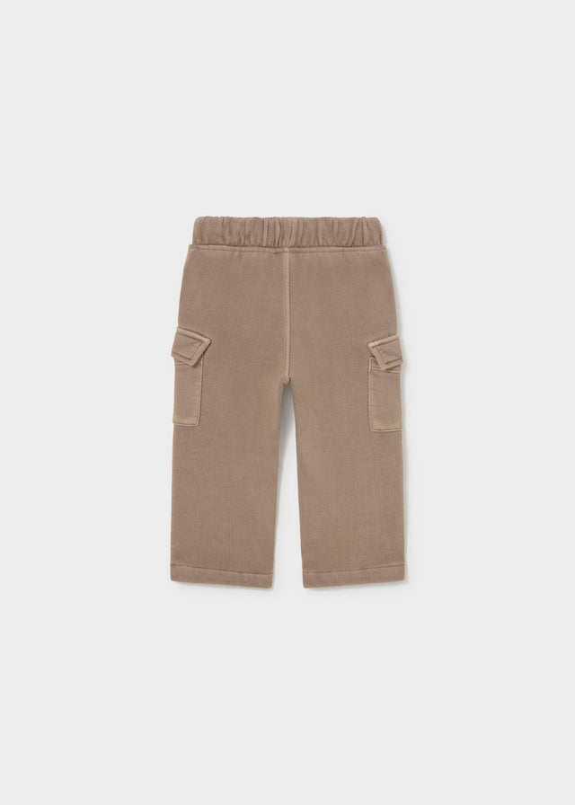 Beige cargo pants on a white background