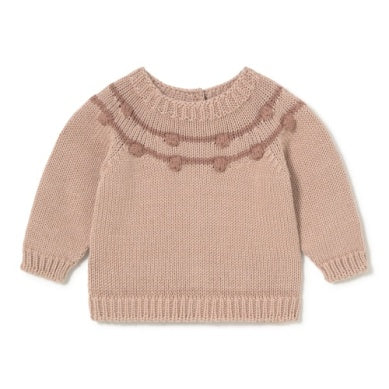 Knitted sweater with bobble details on a white background