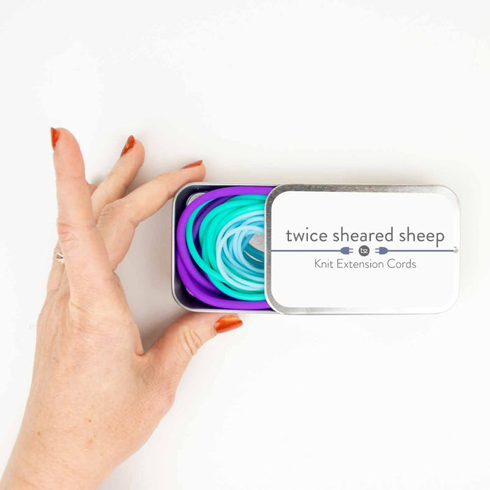 Two Knit Extension Cords in Twice Sheared Sheep branded packaging on white background
