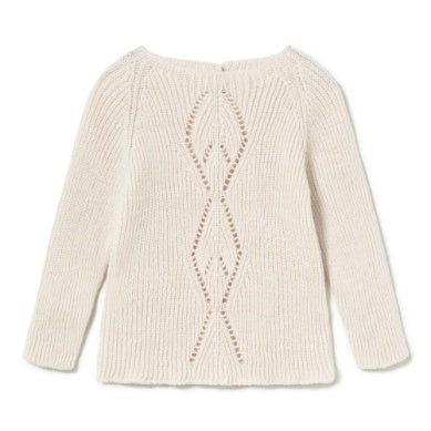 Cream-colored sweater with a diamond pattern on a white background