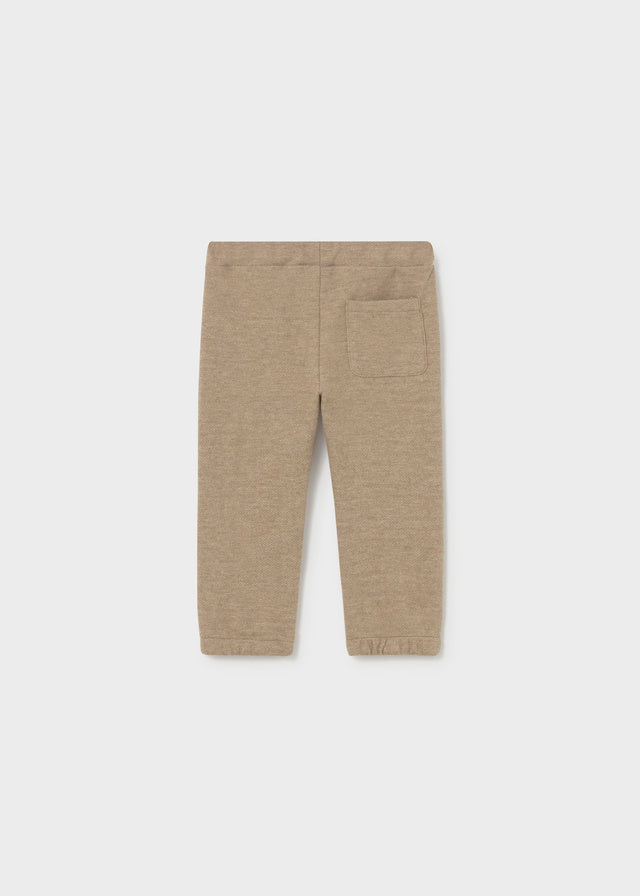 Beige pants on a white background