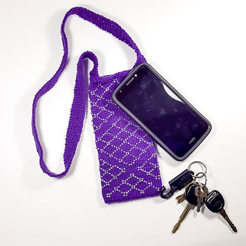 Purple beaded knitted crossbody bag with phone and keys showing Knitting With Beads class project