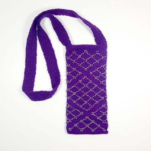 Close-up of purple beaded knitted bag showing detailed beadwork technique from the class