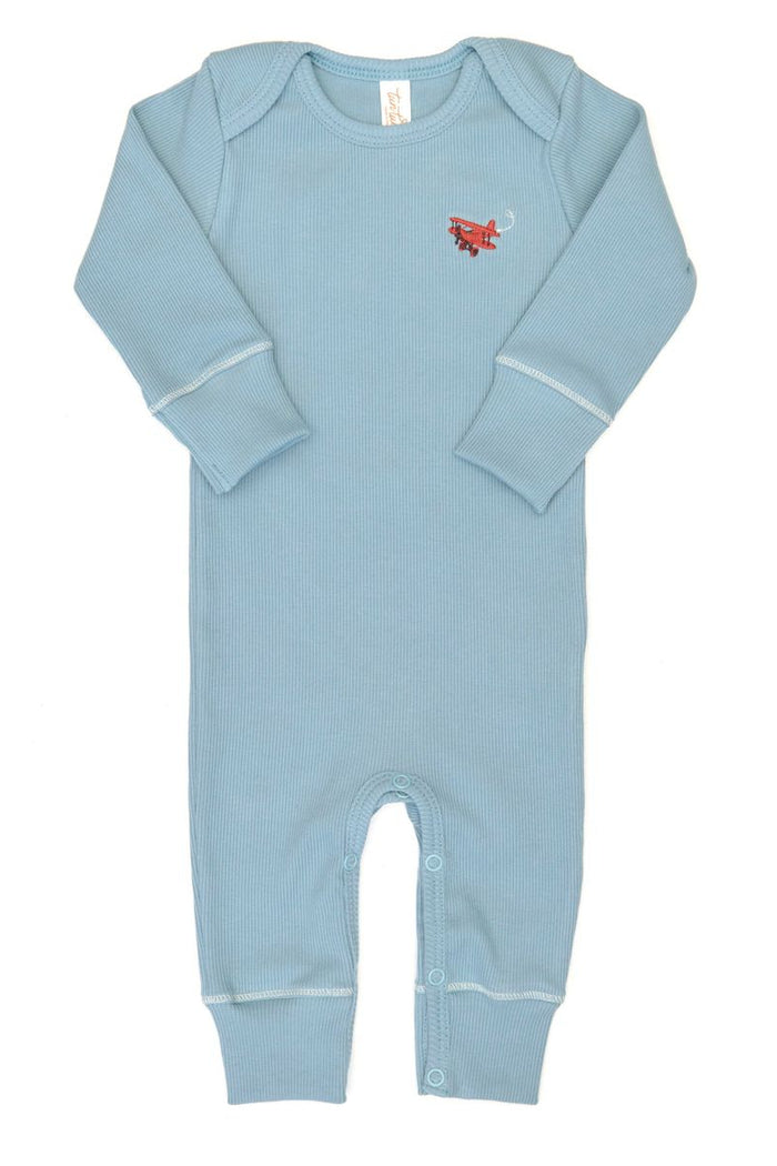 Blue baby onesie with a red airplane on a white background