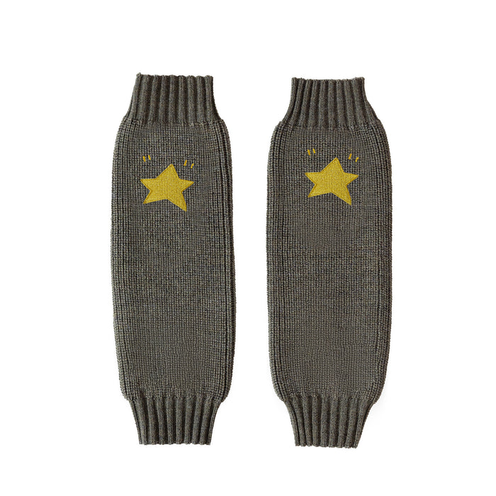 Pair of green/gray knitted leg warmers with yellow star designs on a white background