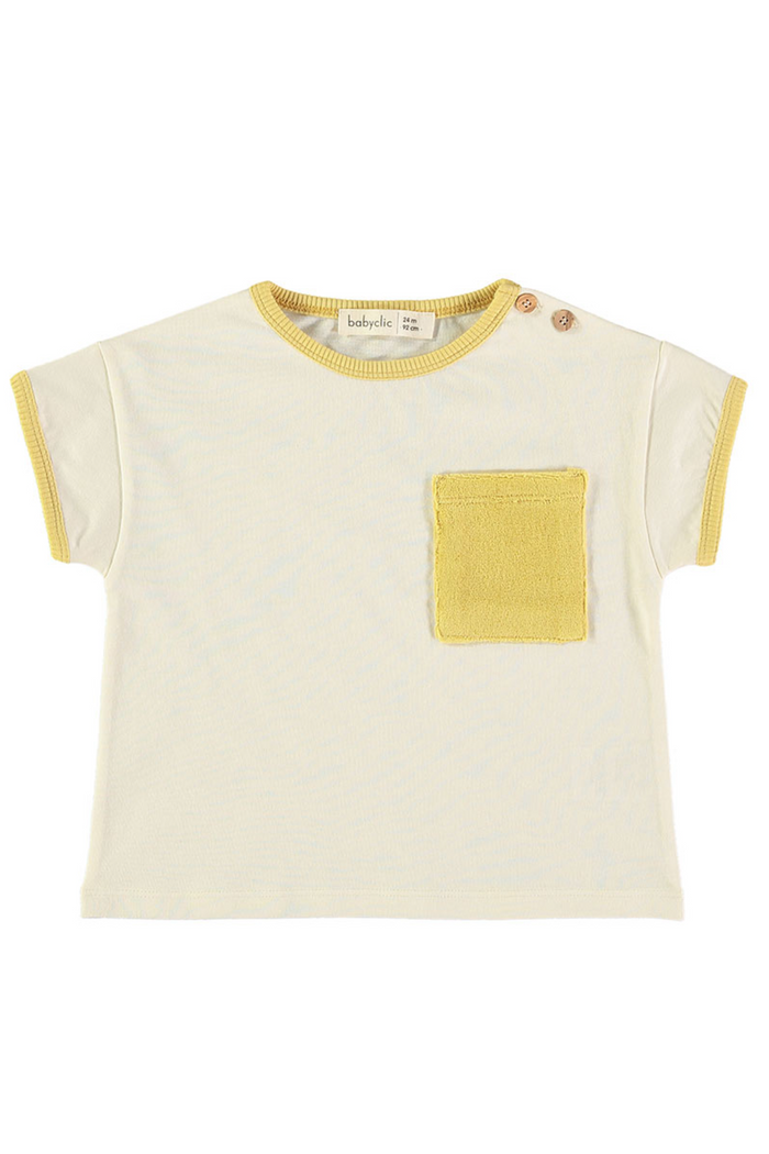 Ringer t-shirt with a yellow pocket on a white background