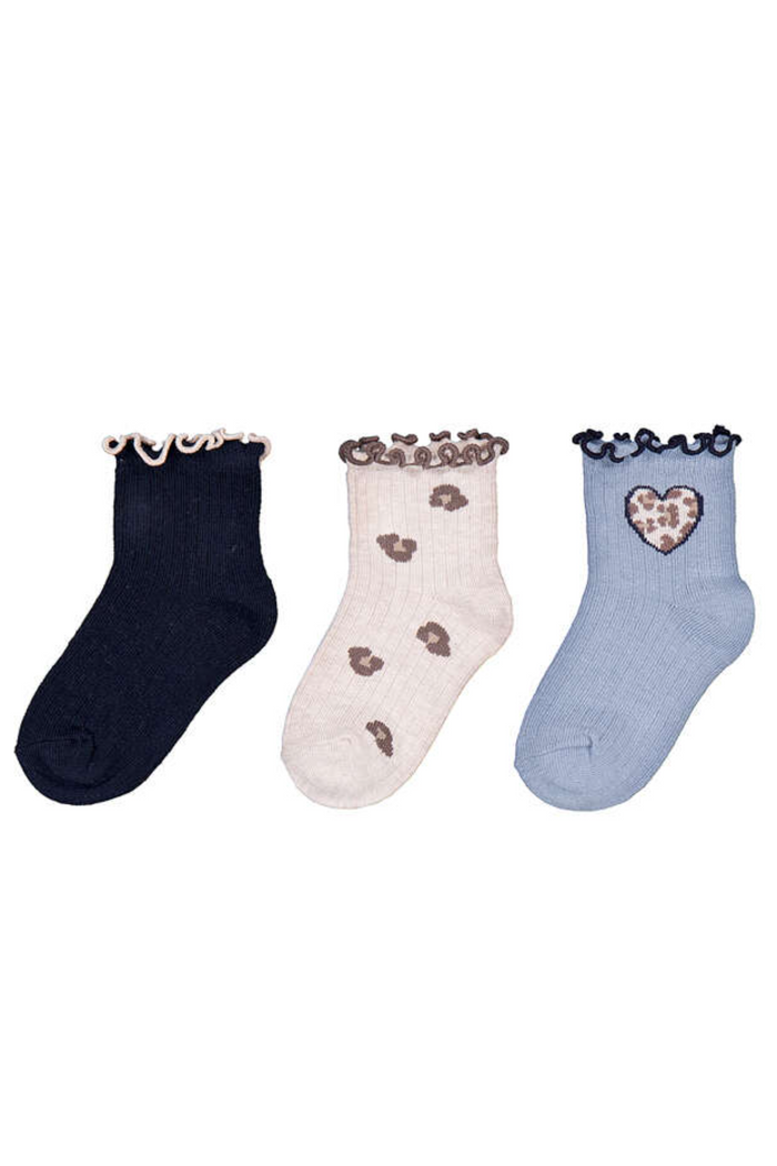 Three pairs of socks with decorative elements on a white background