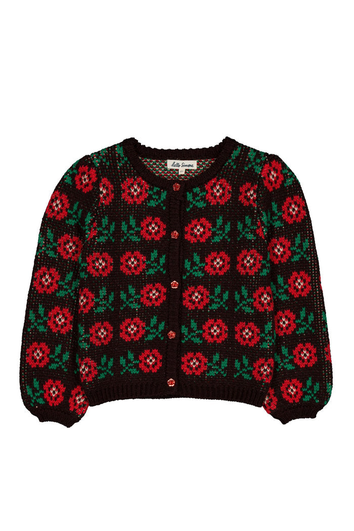 A black knit cardigan sweater featuring a repeating red rose and green leaf pattern, with a button-up front and long balloon sleeves, shown against a plain white background.