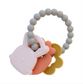 teething charms on white background