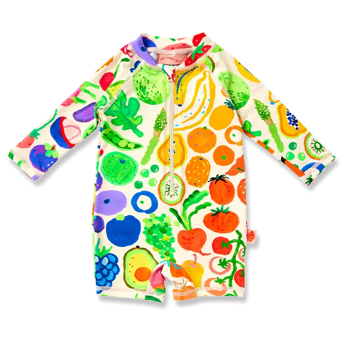 Children's swimsuit with colorful fruit and vegetable pattern on a white background