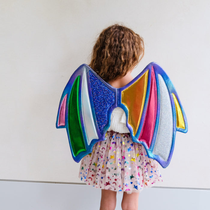 child wearing dragon wing costume