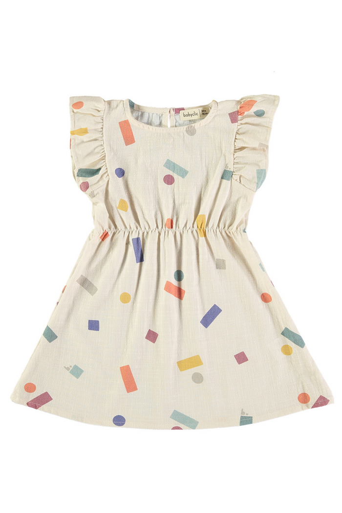 Beige dress with colorful abstract pattern on a white background