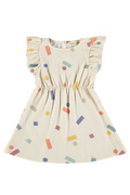 Beige dress with colorful abstract pattern on a white background