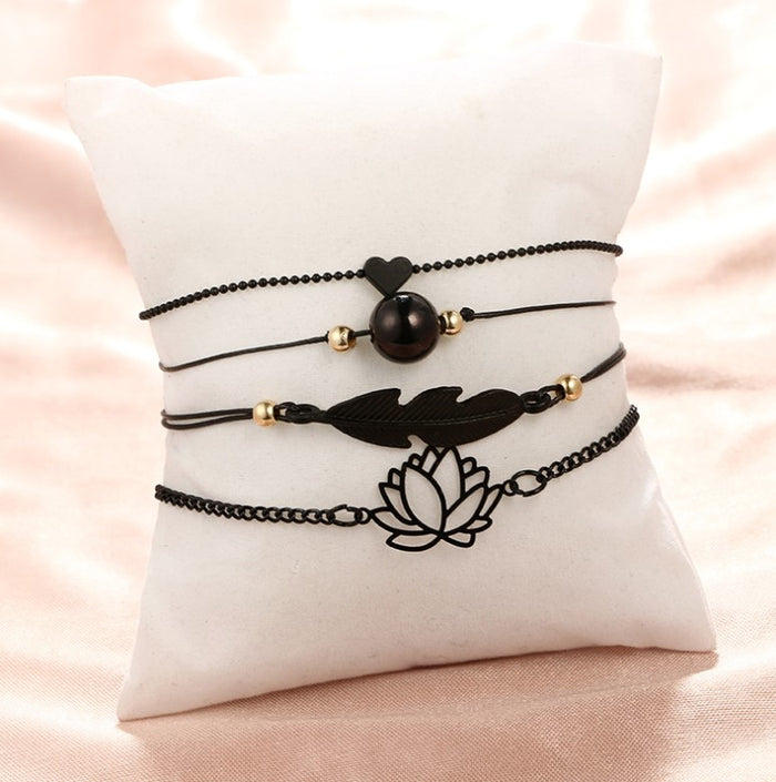 Midnight Zen Matte Black Bracelet Set | Bohemian Lotus & Feather Charms 4-Piece Stack