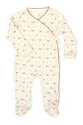 Baby onesie with bow pattern on a white background