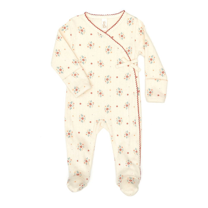 Baby onesie with floral pattern on a white background