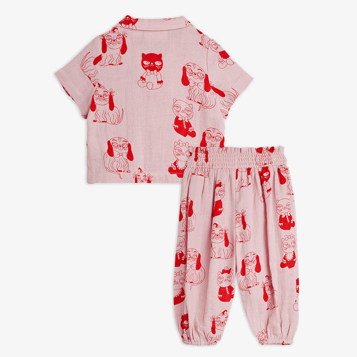 Children's set with red baby animal pattern on pink fabric
