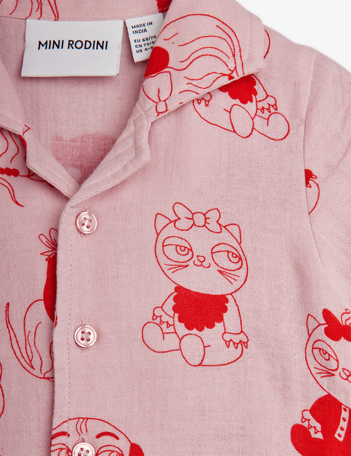 Pink shirt with red cat illustrations and Mini Rodini label