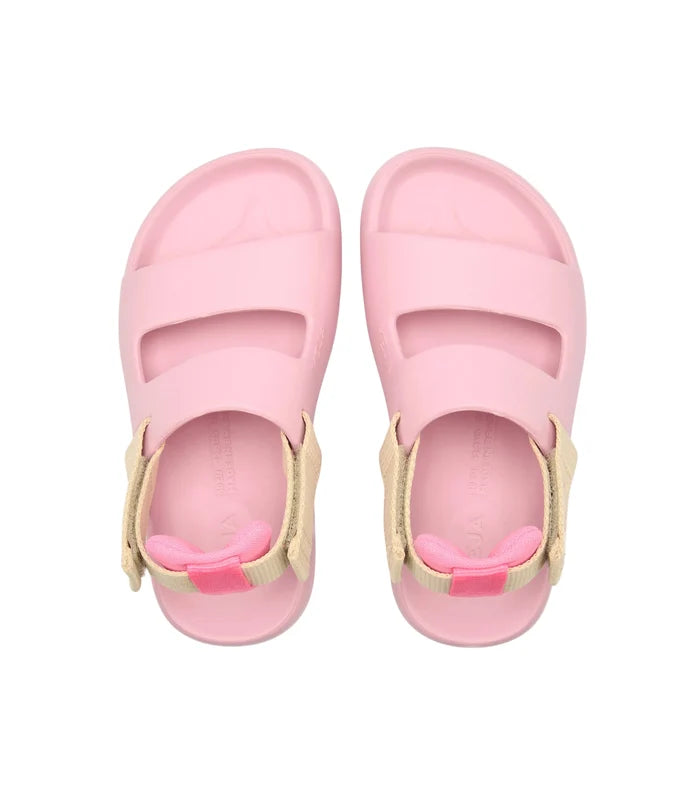 Pair of pink sandals with beige straps on a white background