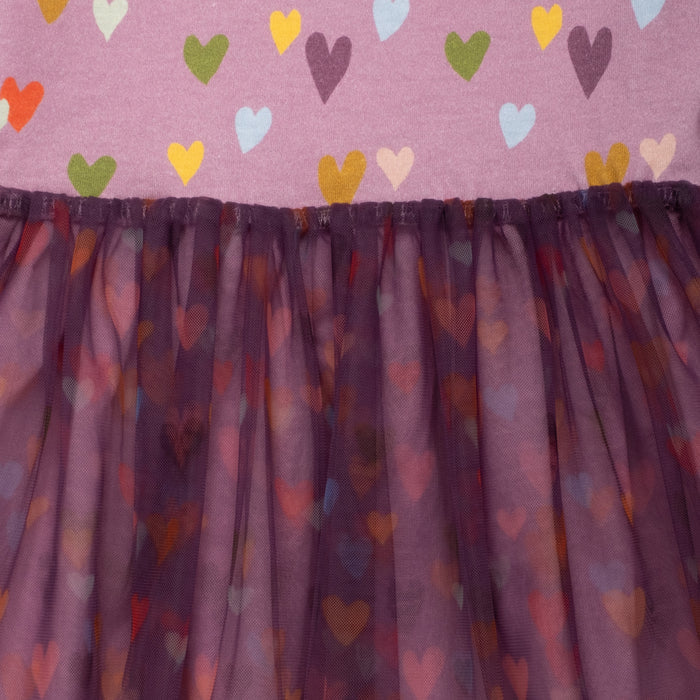 Skirt with colorful heart pattern on a pink background