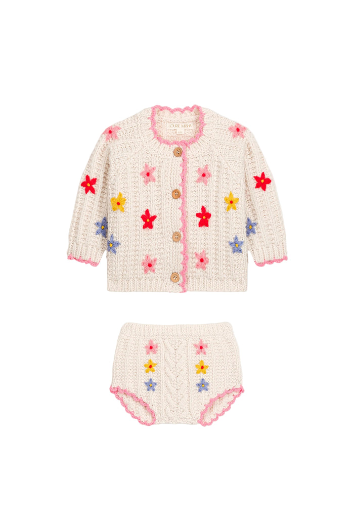 A baby knit two-piece outfit set consisting of a cardigan and matching diaper cover. The cardigan is cream-colored with pink trim, brown buttons, and colorful embroidered flowers in red, yellow, and blue.