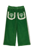 Green corduroy cropped pants with decorative white embroidered pocket details and white side stripes, shown flat on a white background.